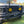 Load image into Gallery viewer, Front view of a vehicle with additional lights mounted on the bumper
